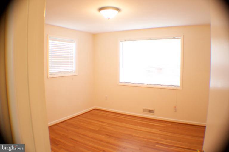 3710 Kayson Street Silver Spring, MD 20906 - Photo 7 of 24 a view of a room that has a window in it