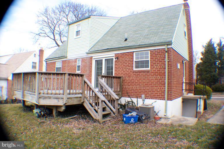 3710 Kayson Street Silver Spring, MD 20906 - Photo 10 of 24 a backyard of a house with table and chairs