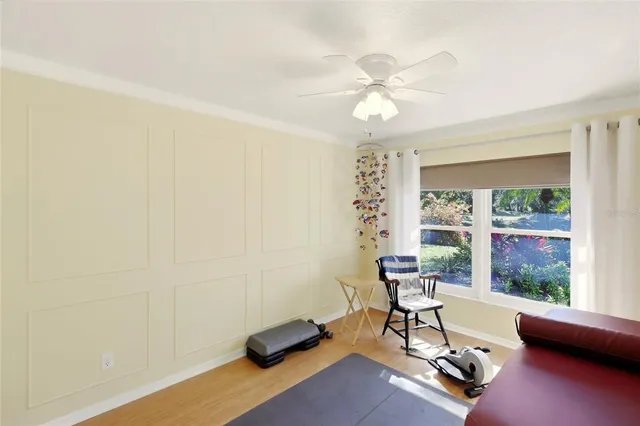 a work room with furniture and a window