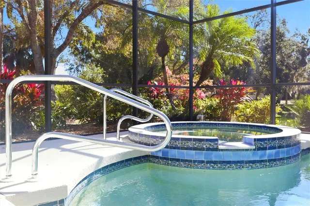 a view of living room kitchen with furniture and fireplace