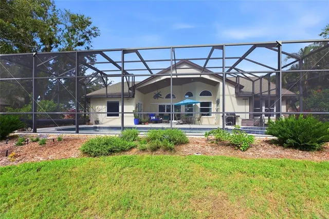 a view of a palm trees in front of a house
