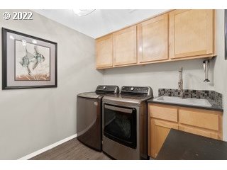 29682 View Street Rainier, OR 97048 - Photo 17 of 30 a kitchen with stainless steel appliances granite countertop a stove a sink and a microwave