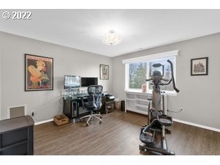 29682 View Street Rainier, OR 97048 - Photo 20 of 30 a living room with furniture a window and a flat screen tv