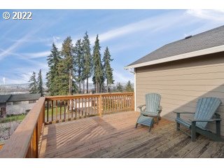 29682 View Street Rainier, OR 97048 - Photo 2 of 30 a deck view with chairs and wooden fence