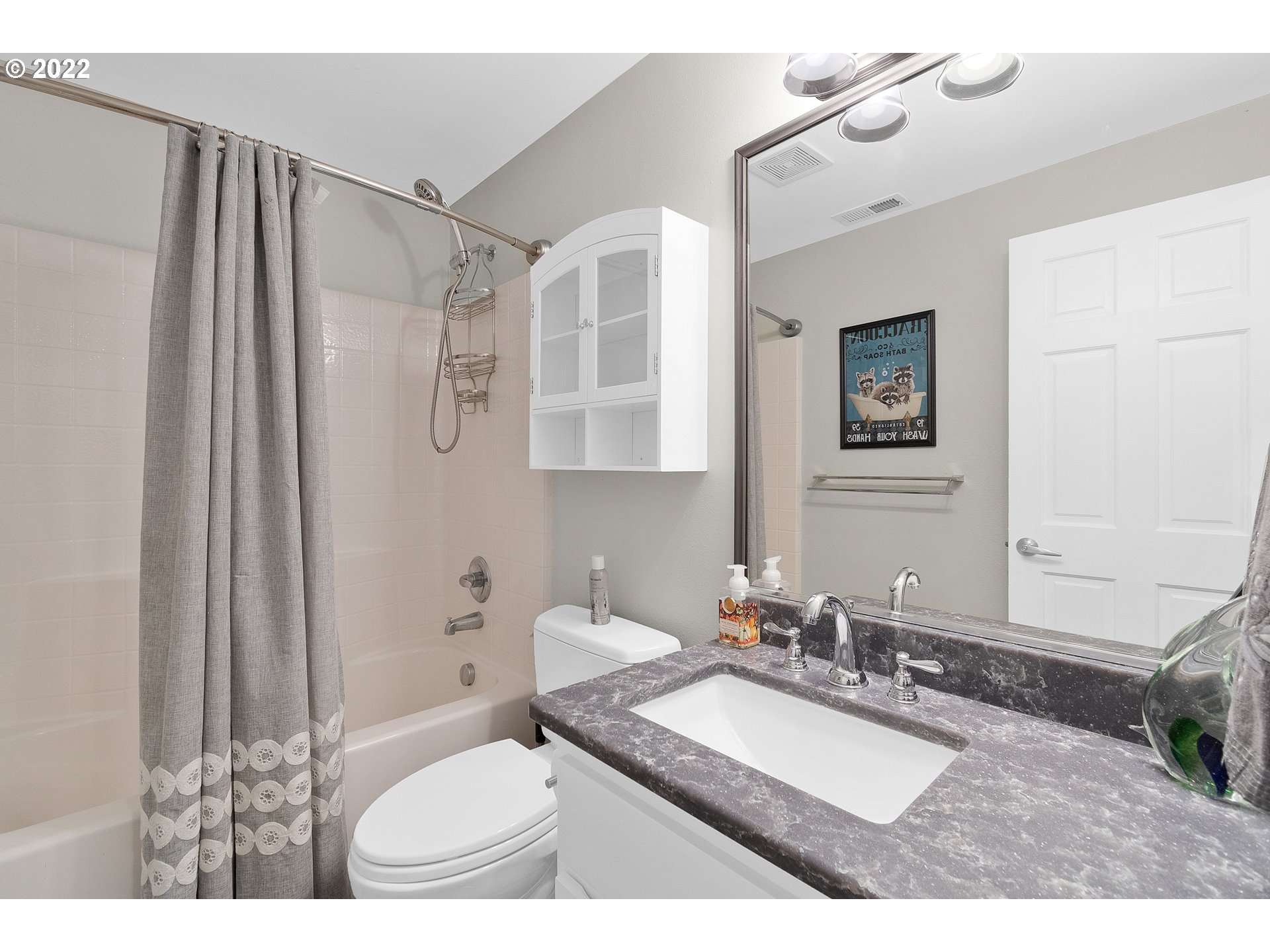29682 View Street Rainier, OR 97048 - Photo 25 of 30 a bathroom with a granite countertop sink mirror vanity and toilet