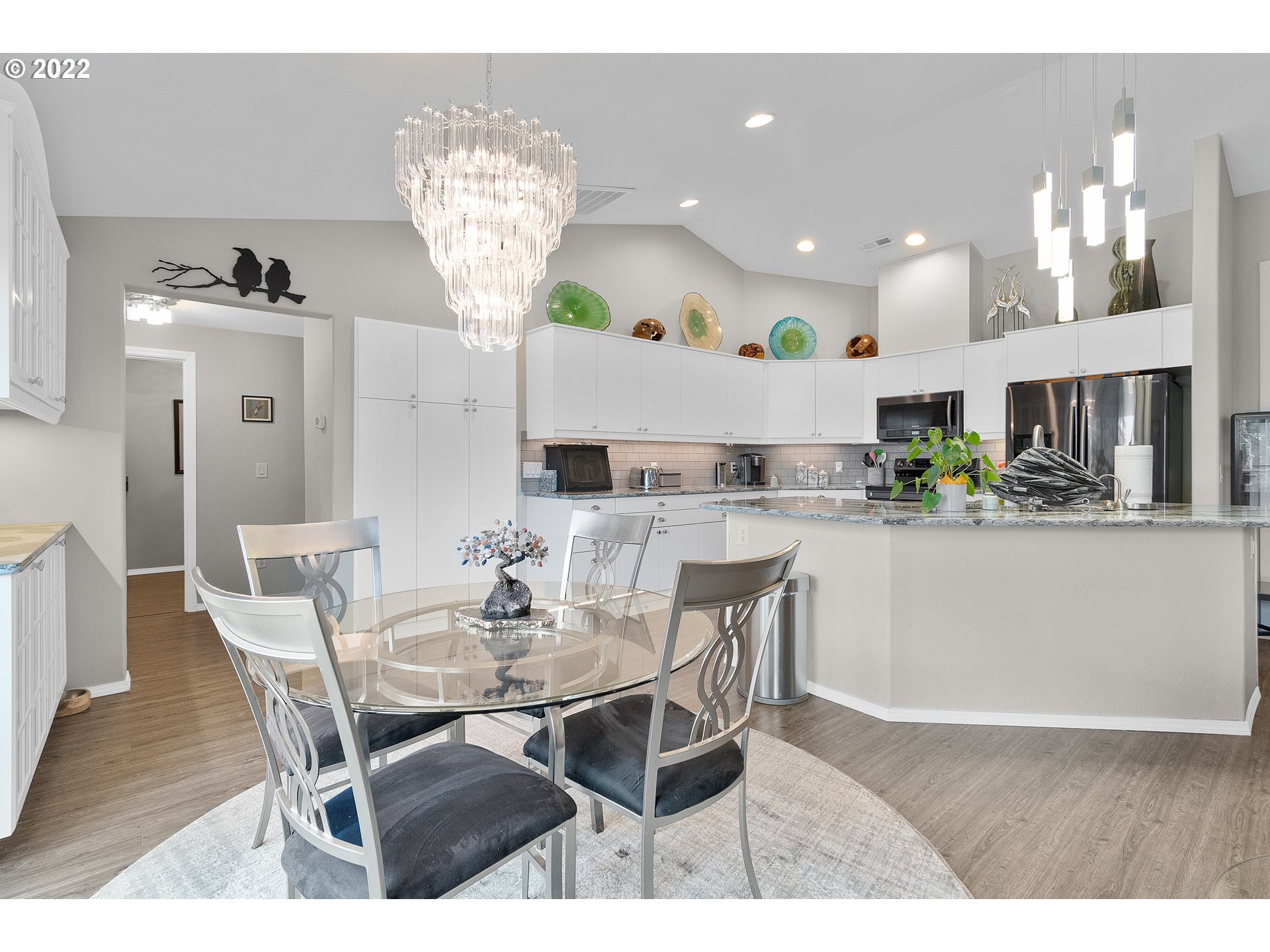 29682 View Street Rainier, OR 97048 - Photo 29 of 30 a view of a dining room with furniture and chandelier