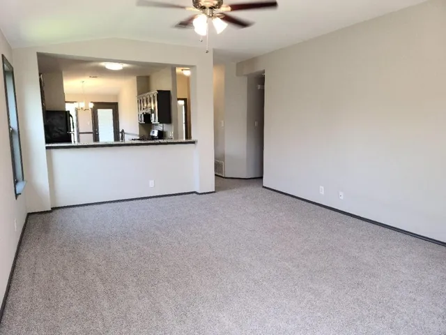 a view of a kitchen with a sink
