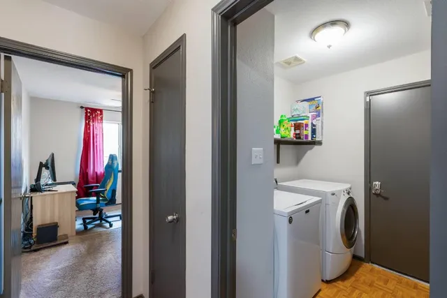 a utility room with dryer and washer