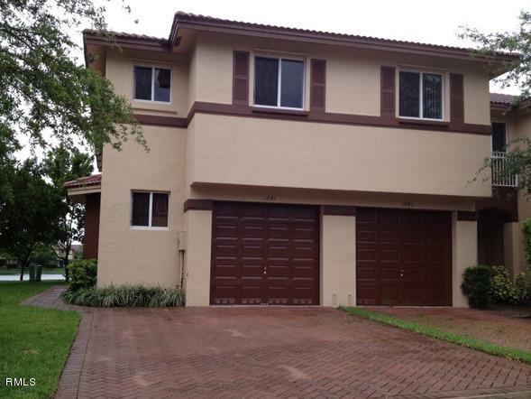 1941 Alamanda Way Riviera Beach, FL 33404 - Photo 1 of 1 Front