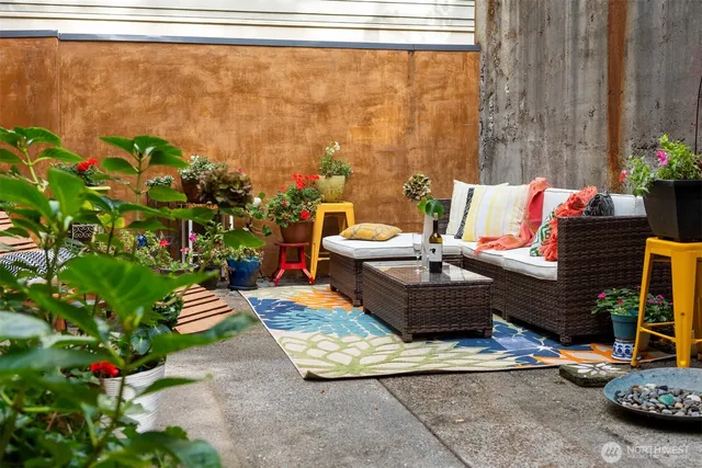 a outdoor living space with furniture and a potted plant