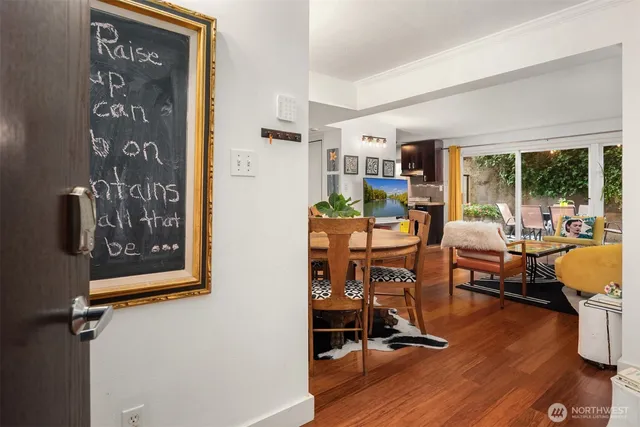 a view of a livingroom with furniture and a window