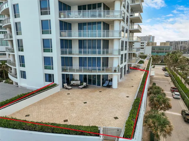 a view of outdoor space with palm trees