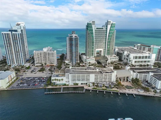 a view of a hallway with a bathroom