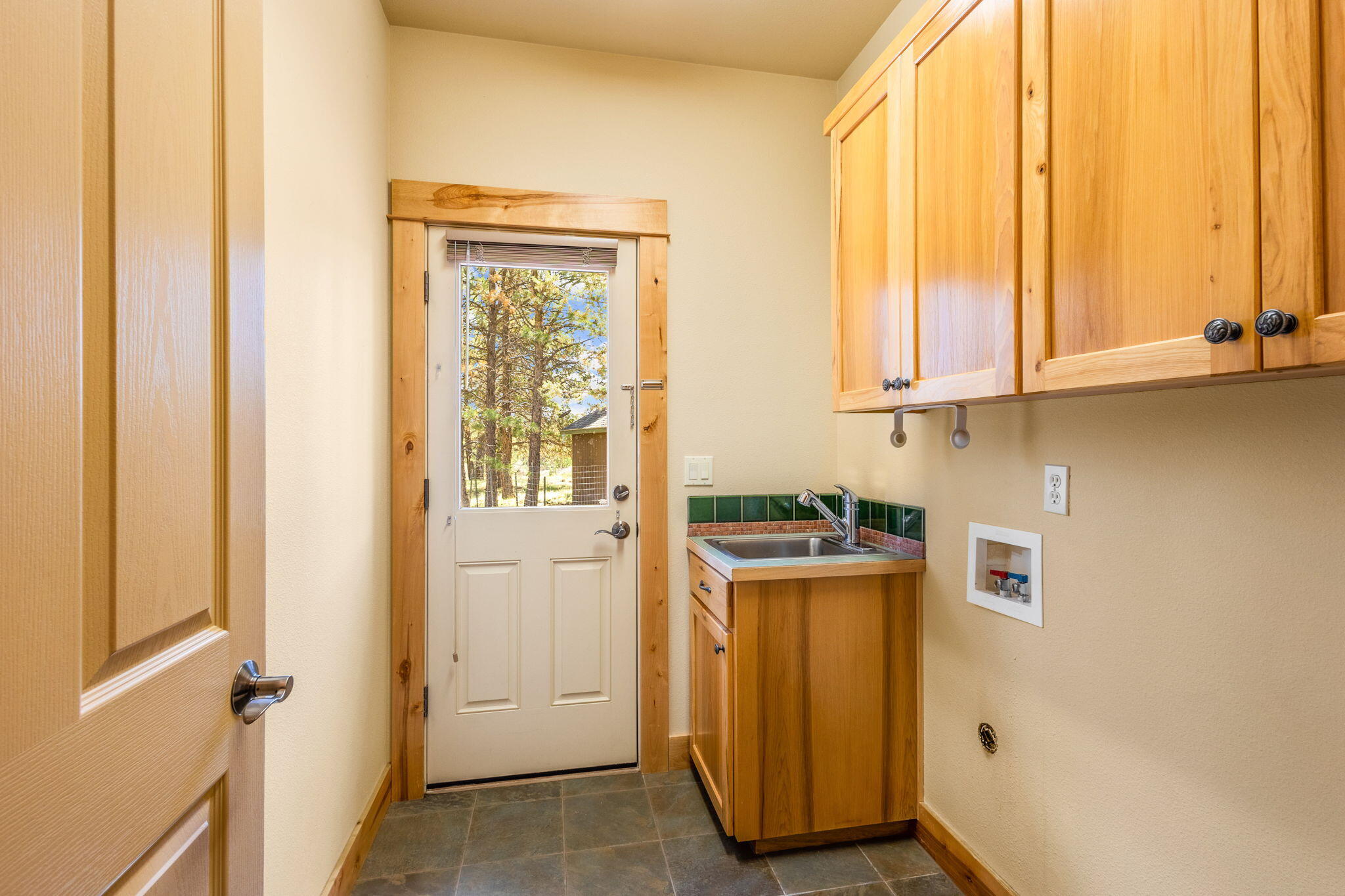 21405 Back Alley Road Bend, OR 97702 - Photo 18 of 48 a view of a kitchen with a window