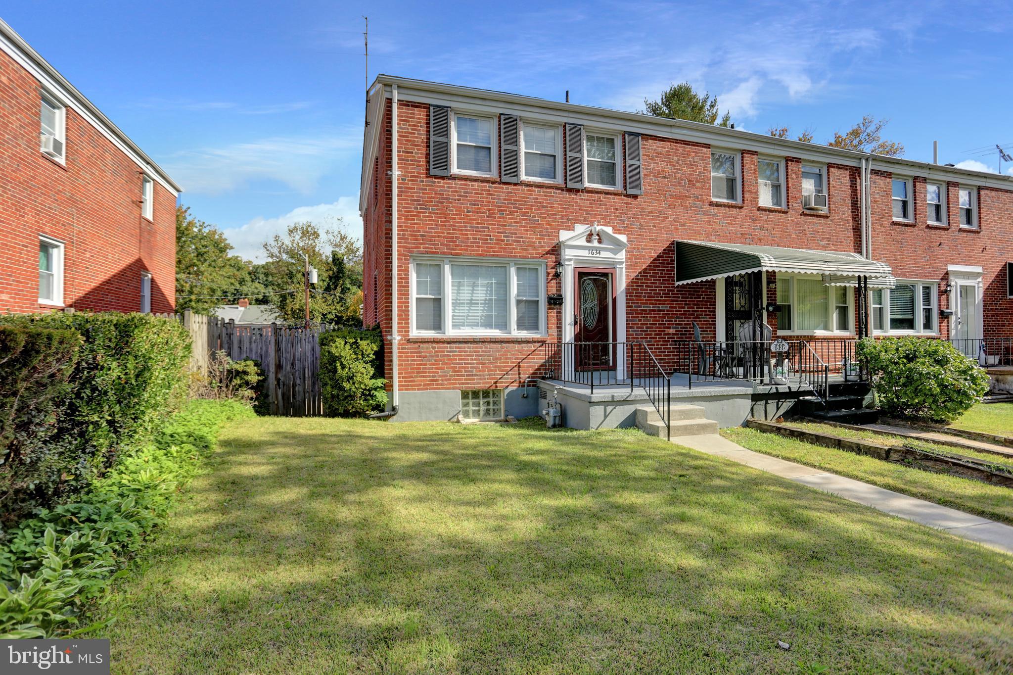 1634 Walterswood Road Baltimore, MD 21239 - Photo 21 of 28 Manicured Lawn