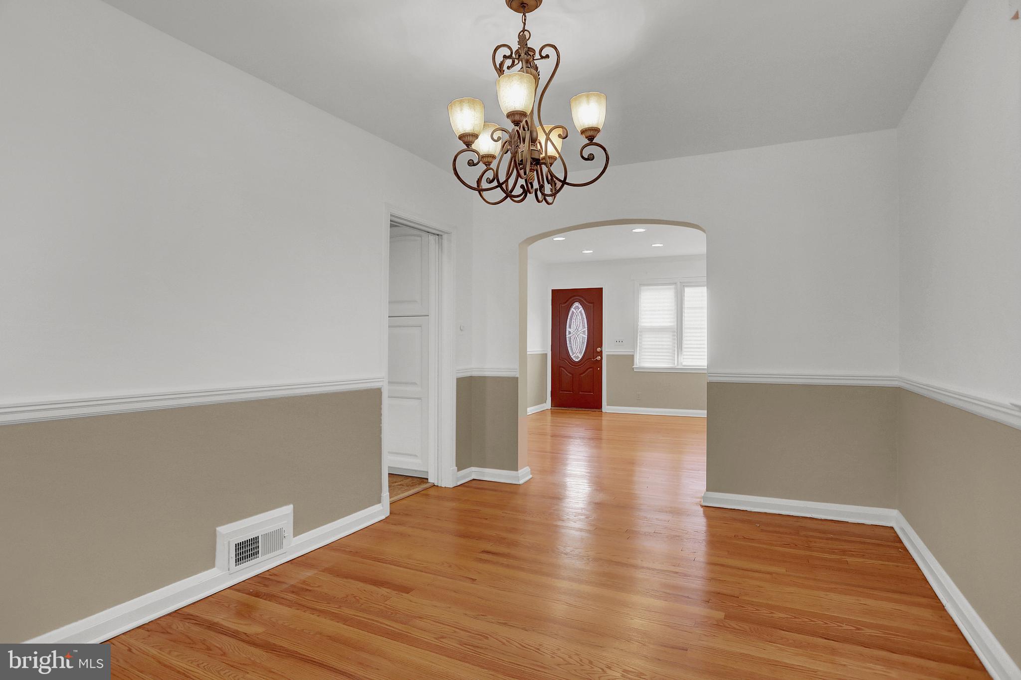1634 Walterswood Road Baltimore, MD 21239 - Photo 4 of 28 Lovely Chandelier in Dining Room