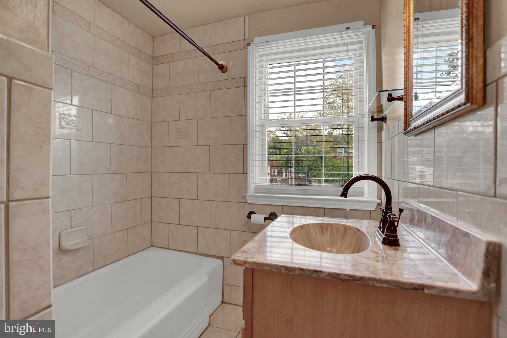 1634 Walterswood Road Baltimore, MD 21239 - Photo 10 of 28 Hall Bathroom