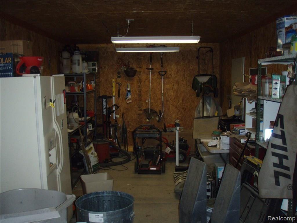11754 Merrill Road Whitmore Lake, MI 48189 - Photo 37 of 42 Storage Area In 4 Car Garage