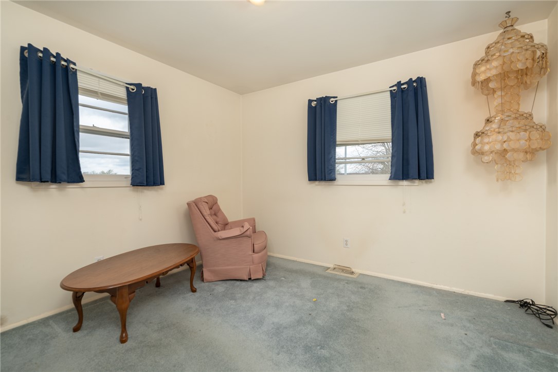 795 Spring Garden Place Dayton, OH 45431 - Photo 24 of 34 This bright room features soft carpeting and ample natural light, ideal for peaceful relaxation.