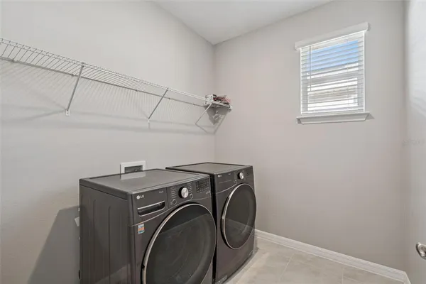 a view of a room with a large window