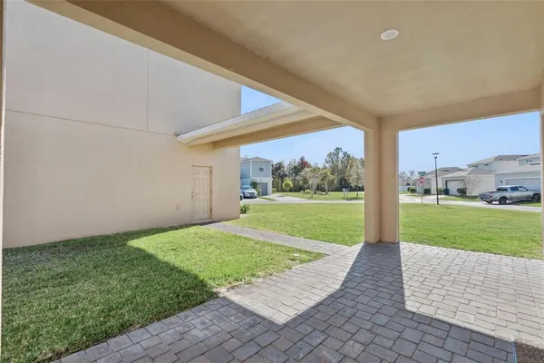 a view of backyard with garage