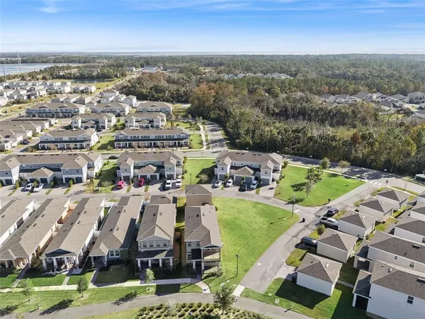 an aerial view of residential building with outdoor space