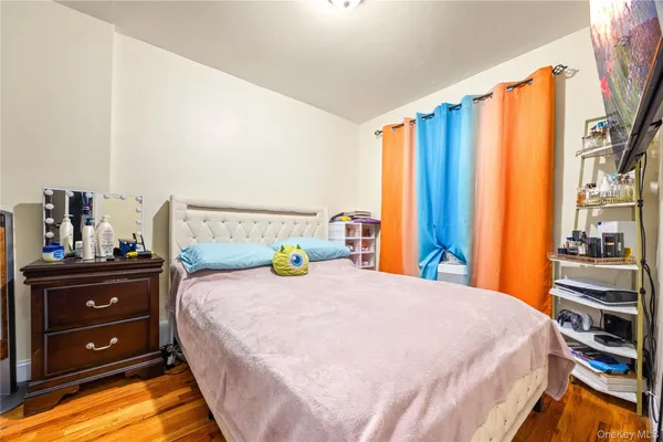 a bedroom with a bed and a closet