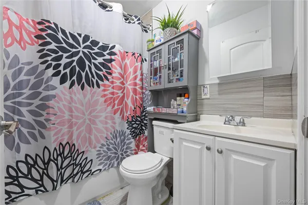 a bathroom with a sink and a toilet