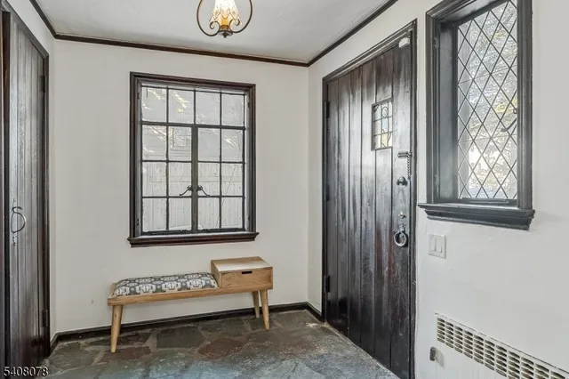 a view of a living room and kitchen