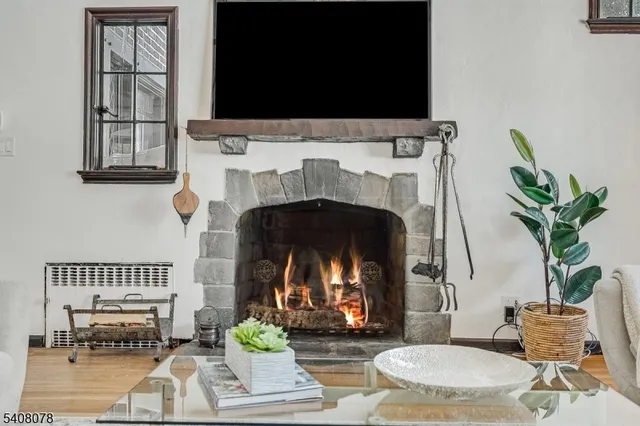 a kitchen with stainless steel appliances kitchen island granite countertop a stove a sink and a refrigerator