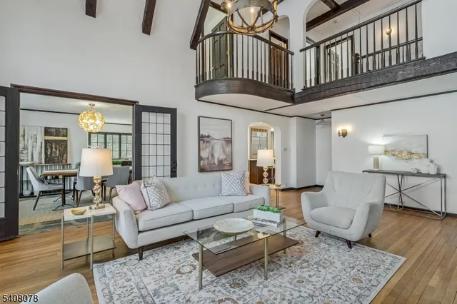 a bedroom with a bed and a lamp on table