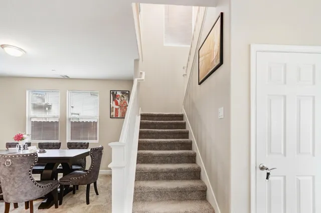 a view of a livingroom with furniture and window