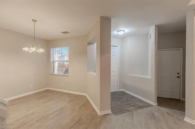 a view of a kitchen with a sink