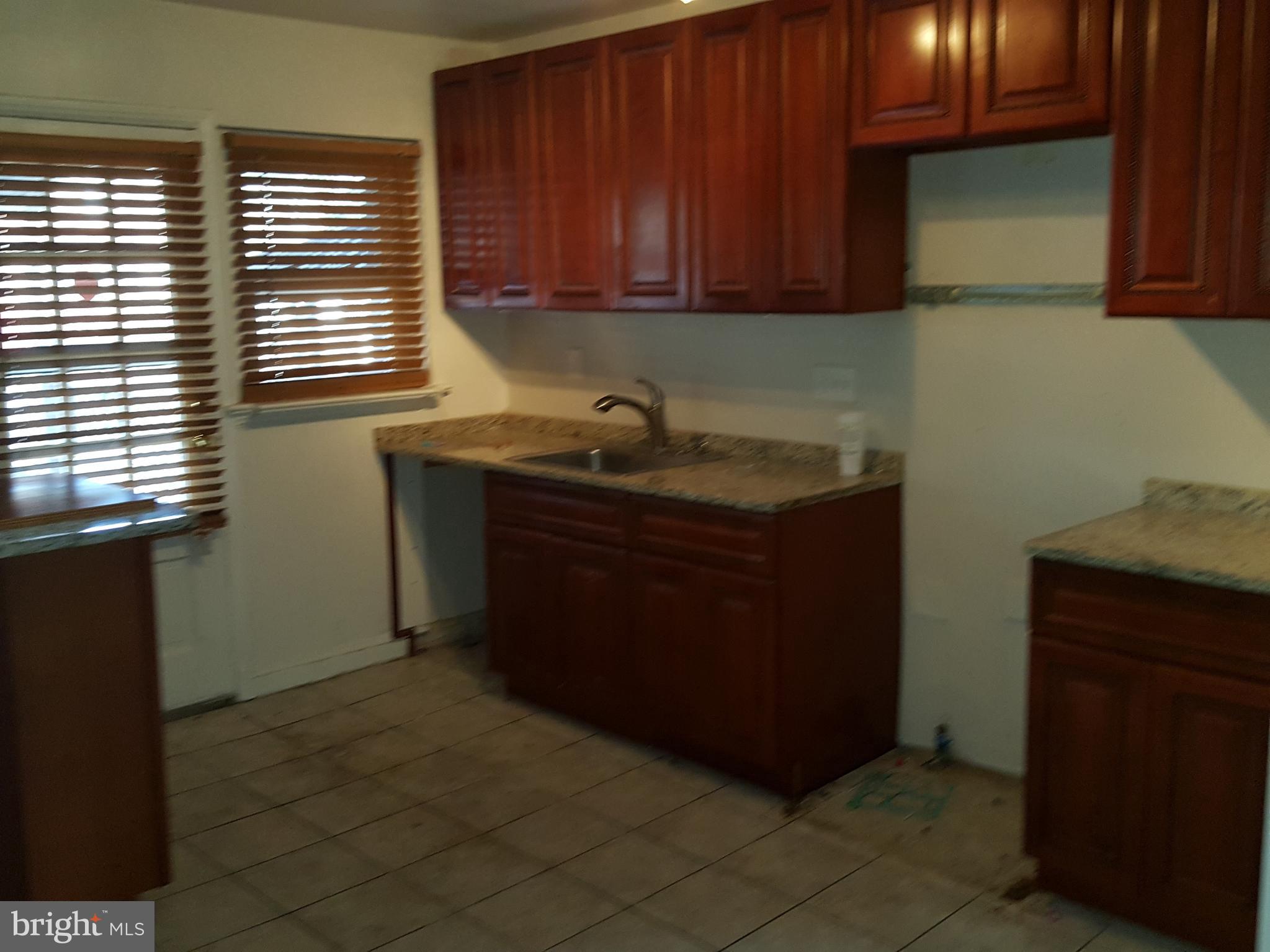 5607 Clearspring Road Baltimore, MD 21212 - Photo 7 of 14 KITCHEN - GRANITE COUNTER TOPS, CERAMIC FLOOR