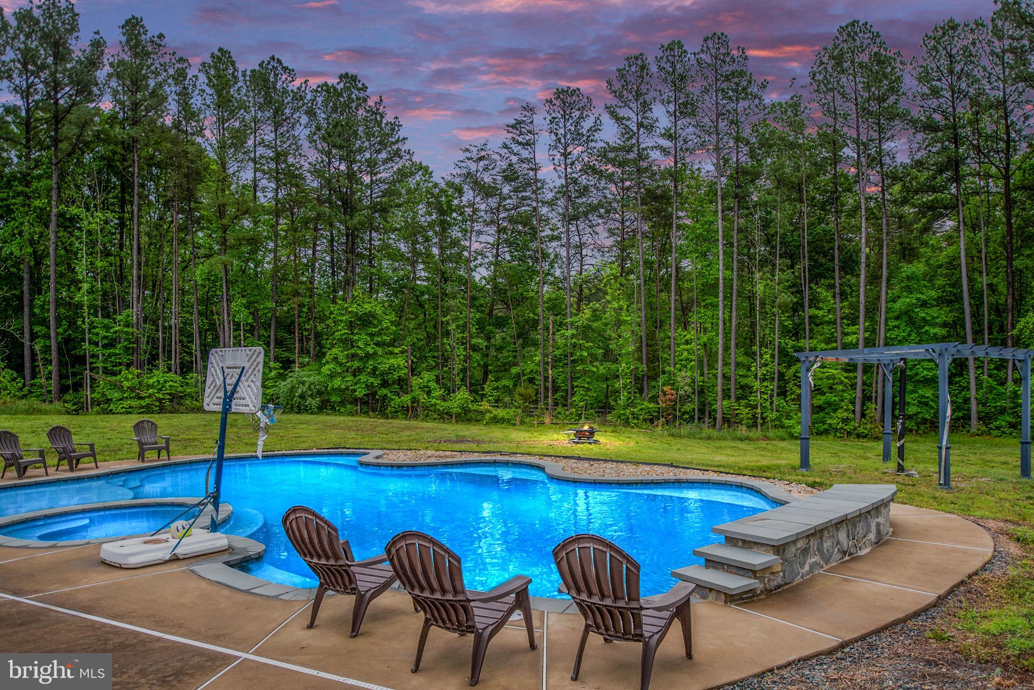 4 Riva Ridge Drive Stafford, VA 22556 - Photo 2 of 96 Luxurious pool has jacuzzi & waterfall feature