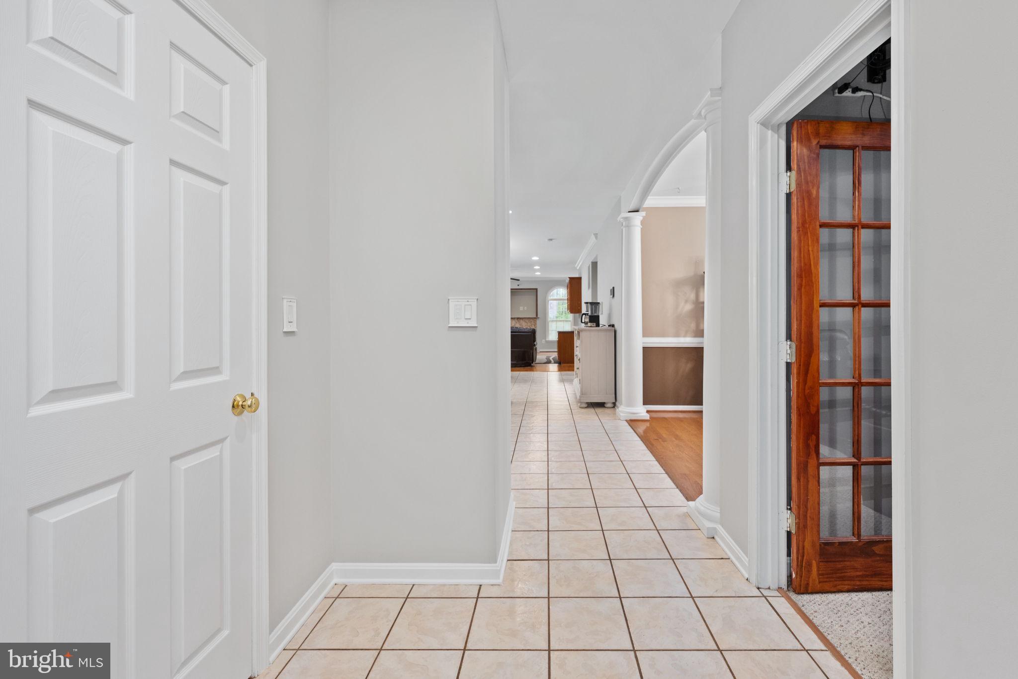 4 Riva Ridge Drive Stafford, VA 22556 - Photo 39 of 96 Columned archway view from garage entry