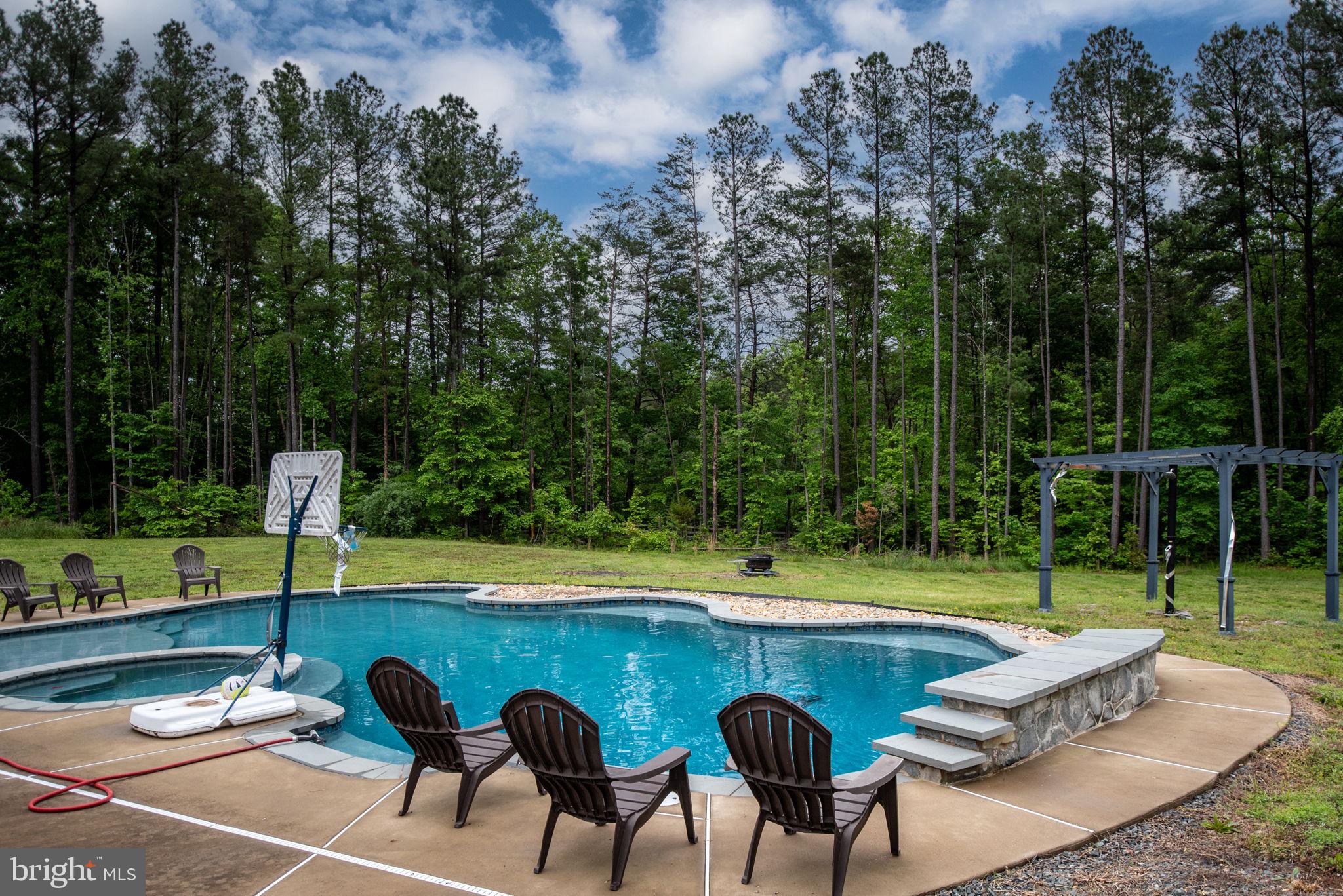 4 Riva Ridge Drive Stafford, VA 22556 - Photo 72 of 96 Patio around pool provides ample sitting area