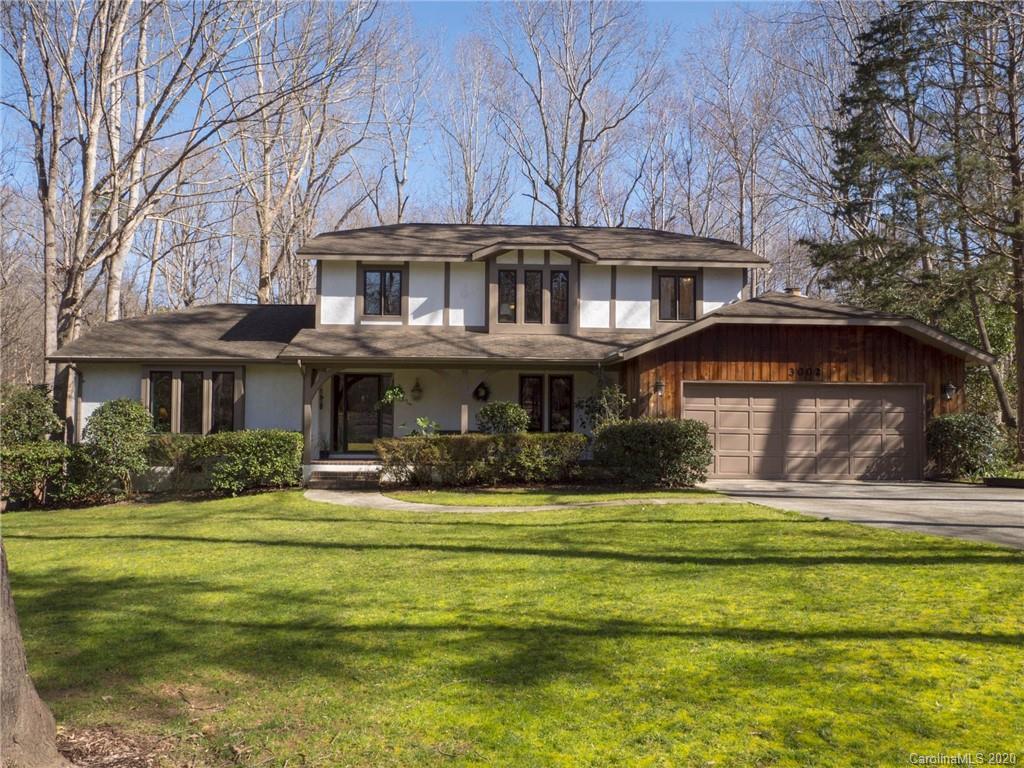 3002 High Ridge Road Charlotte, NC 28270 - Photo 2 of 41 a front view of a building with a swimming pool