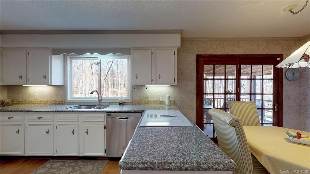 3002 High Ridge Road Charlotte, NC 28270 - Photo 12 of 41 a kitchen with sink and window