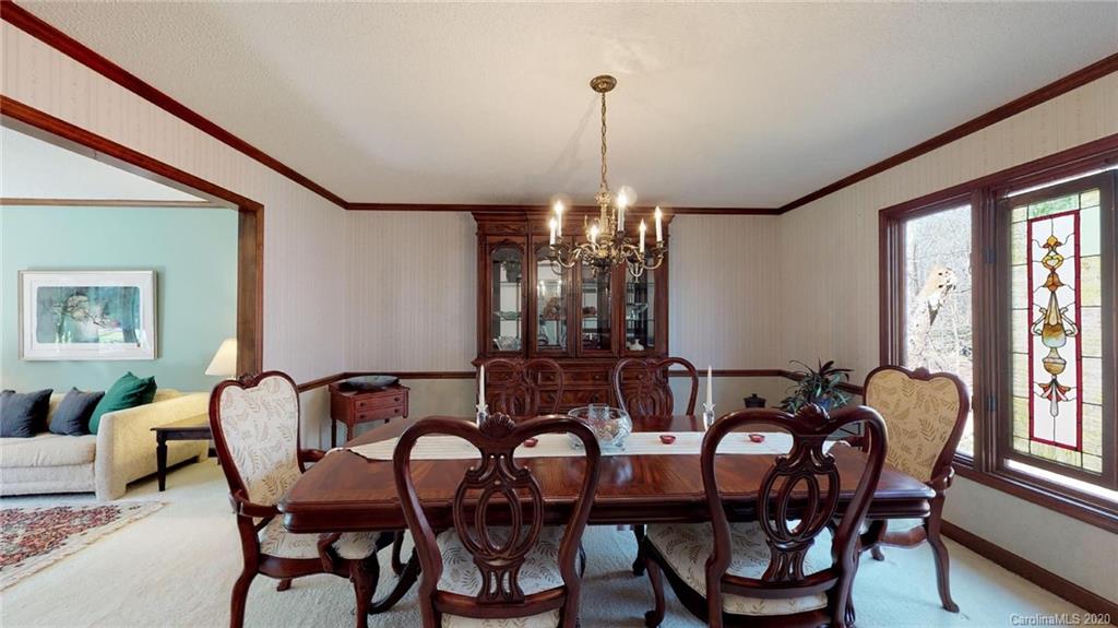 3002 High Ridge Road Charlotte, NC 28270 - Photo 16 of 41 a view of a dining room with furniture window and outside view