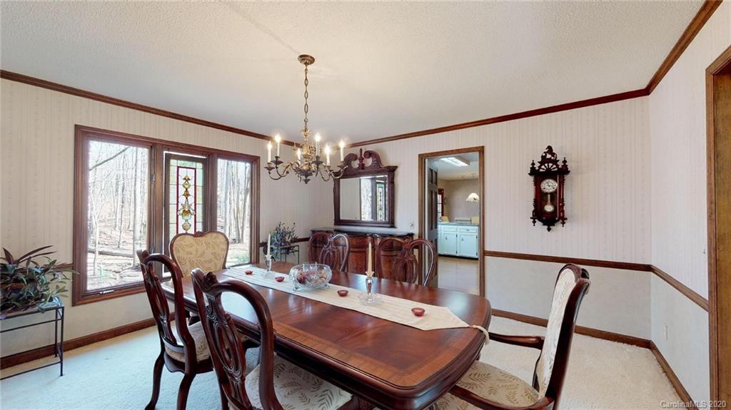 3002 High Ridge Road Charlotte, NC 28270 - Photo 17 of 41 a view of a dining room with furniture window and wooden floor