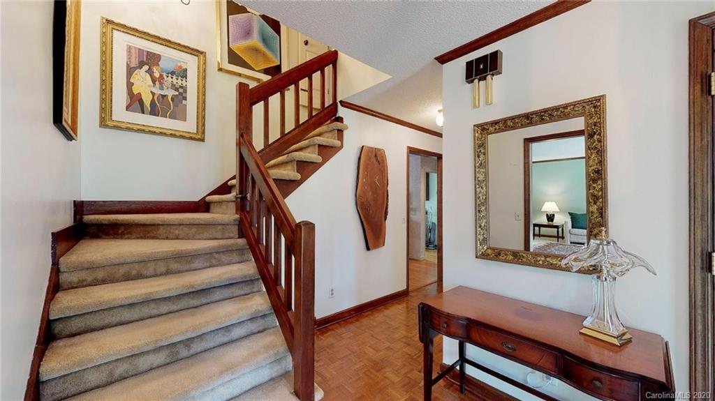3002 High Ridge Road Charlotte, NC 28270 - Photo 19 of 41 a view of entryway and hall with wooden floor