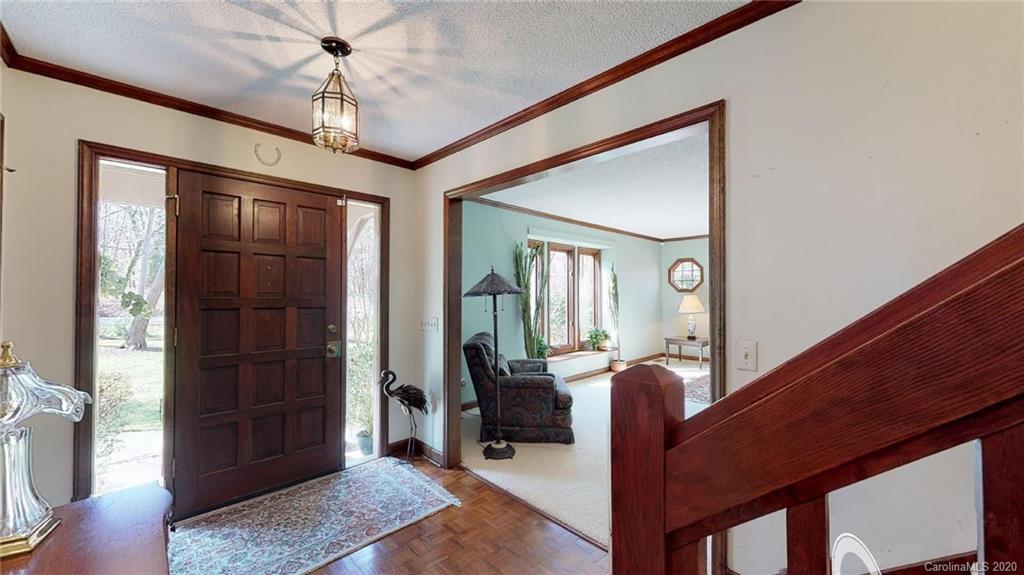 3002 High Ridge Road Charlotte, NC 28270 - Photo 20 of 41 a view of a livingroom with furniture cabinet and front door