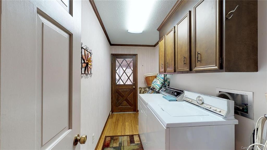 3002 High Ridge Road Charlotte, NC 28270 - Photo 22 of 41 a utility room with dryer and washer