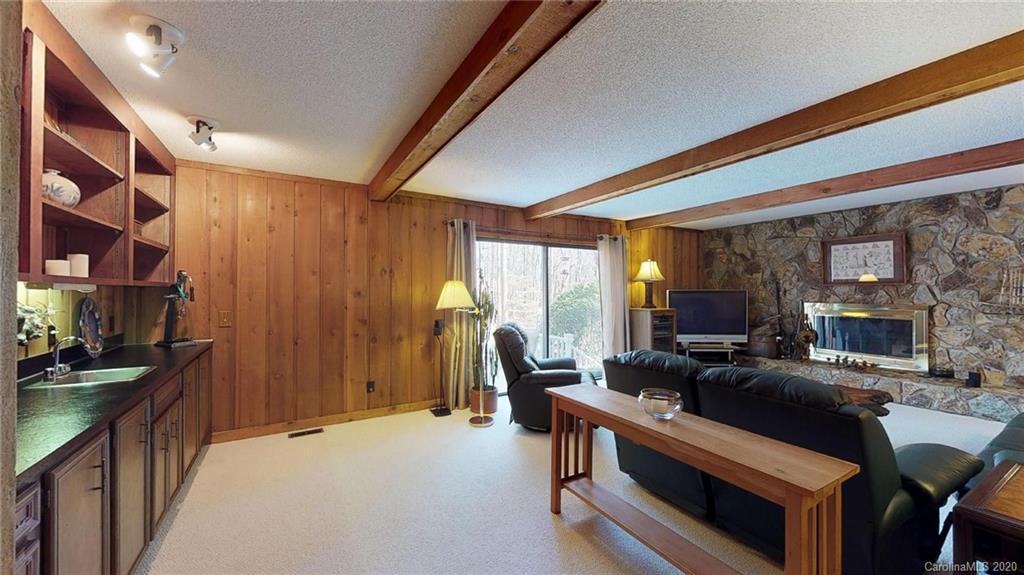 3002 High Ridge Road Charlotte, NC 28270 - Photo 23 of 41 a room with furniture a flat screen tv and large windows