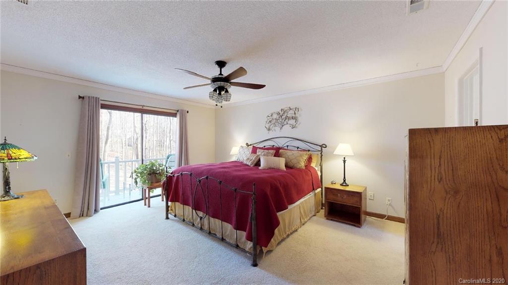 3002 High Ridge Road Charlotte, NC 28270 - Photo 29 of 41 a spacious bedroom with a bed and a window