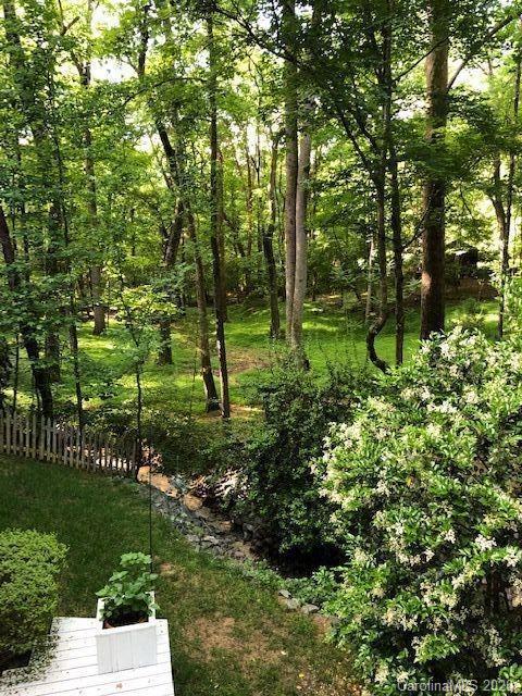 3002 High Ridge Road Charlotte, NC 28270 - Photo 36 of 41 a backyard of a house with lots of green space