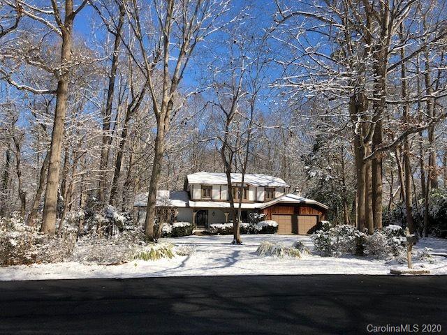 3002 High Ridge Road Charlotte, NC 28270 - Photo 40 of 41 a view of a house with a yard covered with snow