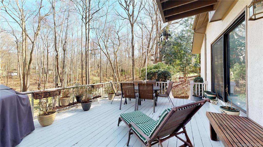 3002 High Ridge Road Charlotte, NC 28270 - Photo 6 of 41 a view of balcony with chairs and wooden fence