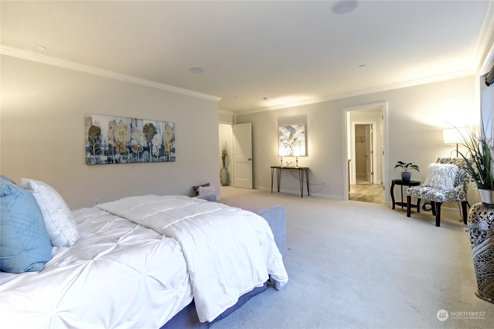 4431 231st Place Southeast Bothell, WA 98021 - Photo 19 of 36 a spacious bedroom with a bed and a couch